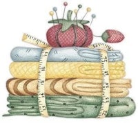 a stack of fabric with a measuring tape and pins
